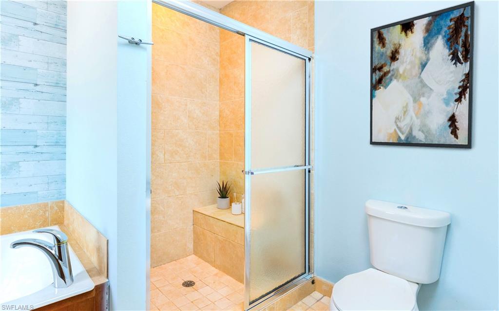 12277 Boat Shell Drive Matlacha Isles, FL 33991 - Photo 39 of 46 a bathroom with a toilet and a shower