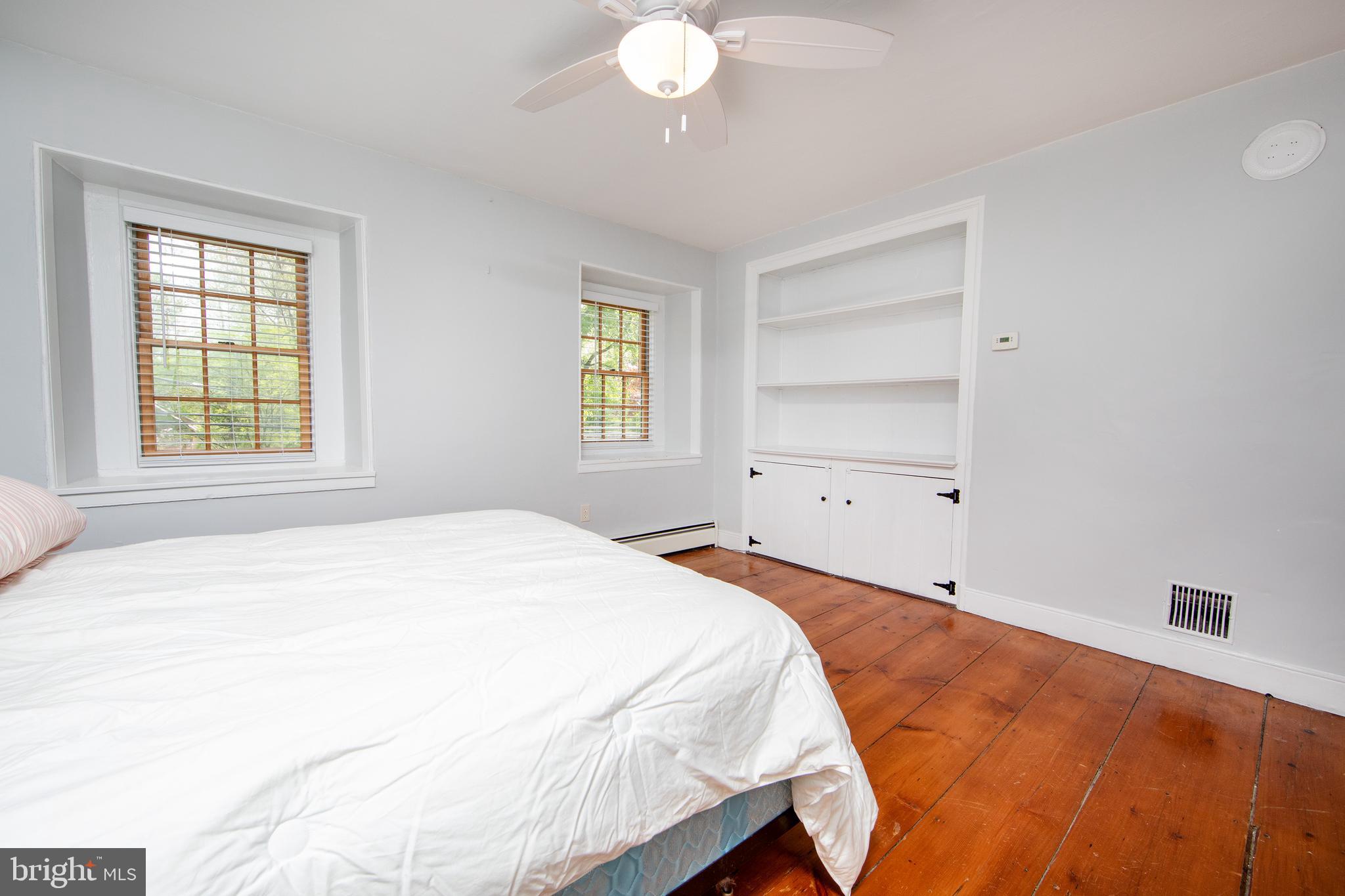 2957 River Road New Hope, PA 18938 - Photo 12 of 30 a bedroom with a bed and a window