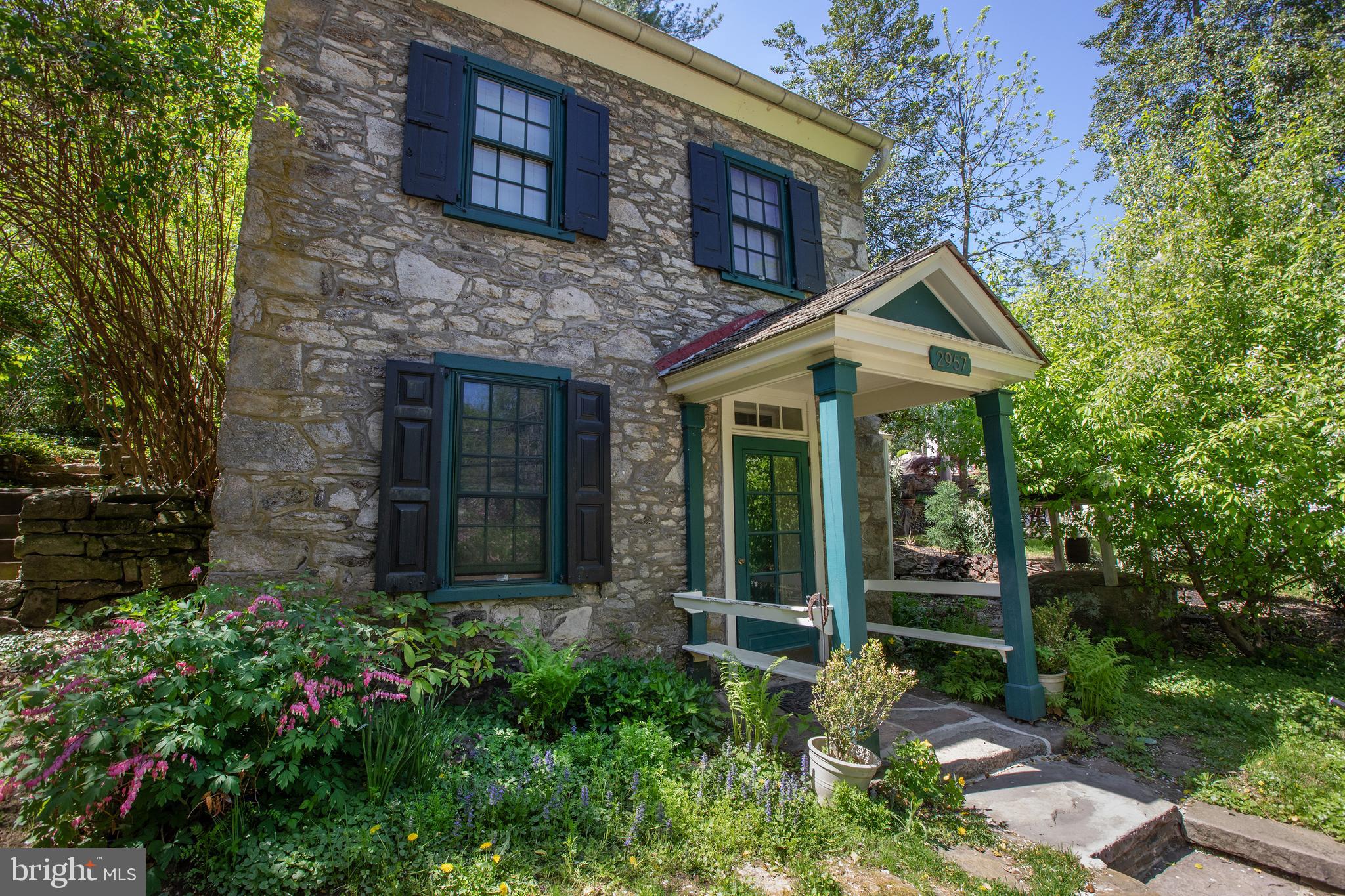 2957 River Road New Hope, PA 18938 - Photo 2 of 30 a front view of a house with garden