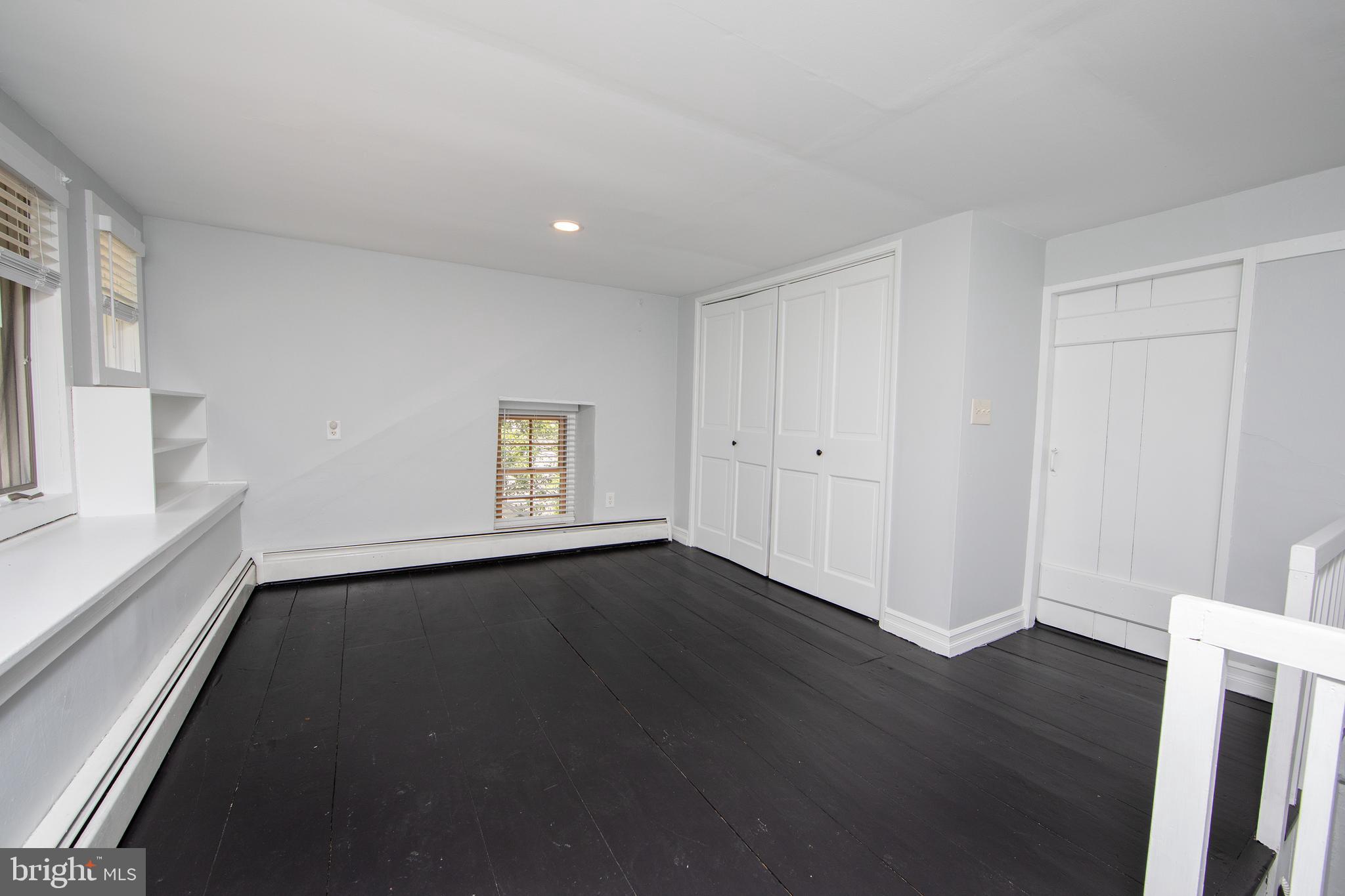 2957 River Road New Hope, PA 18938 - Photo 21 of 30 a view of an empty room with wooden floor and a window