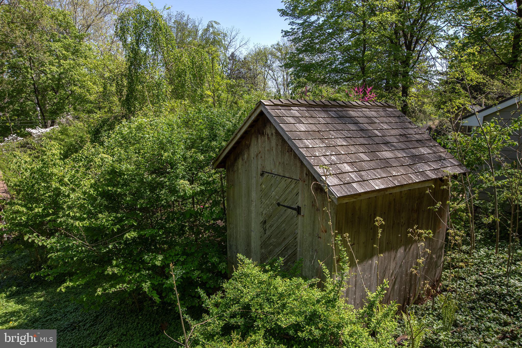 2957 River Road New Hope, PA 18938 - Photo 26 of 30 a view of a wooden house with a tree
