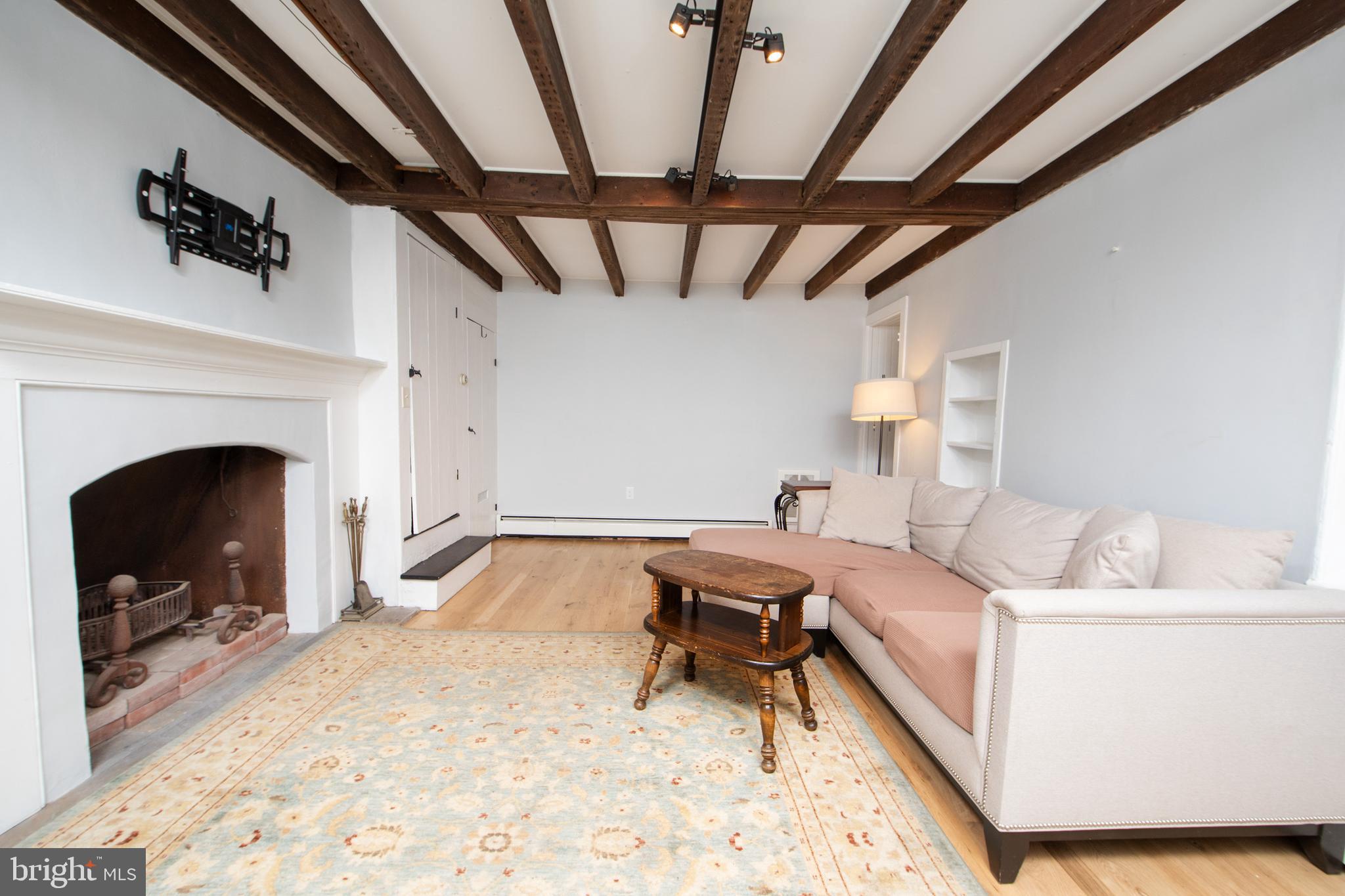 2957 River Road New Hope, PA 18938 - Photo 6 of 30 a living room with furniture and a fireplace