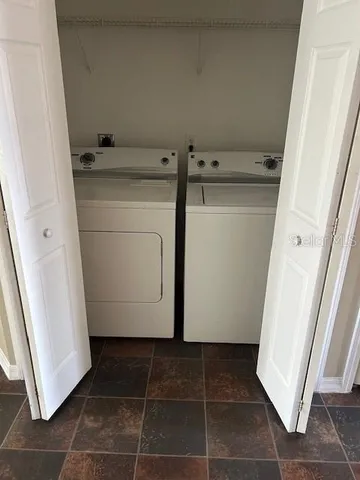 a utility room with a washer and dryer