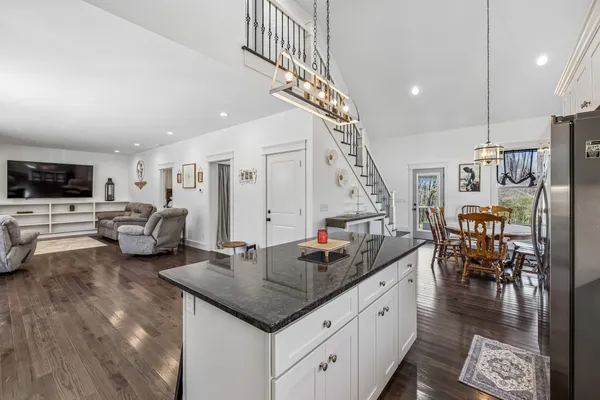 a living room with furniture and a table