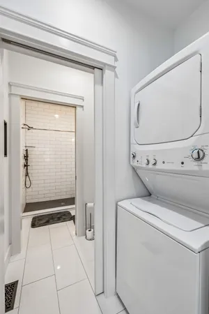 a view of washer and dryer with in a kitchen
