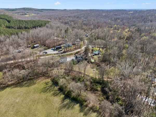 a black and white photo of a white wall