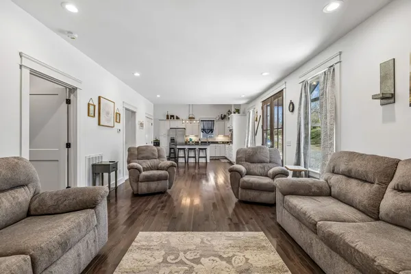 a living room with furniture and a couch