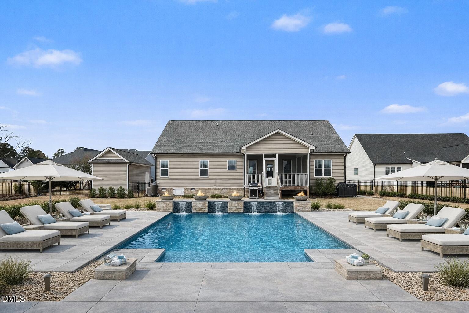 142 Jacqueline Drive Willow Spring, NC 27592 - Photo 2 of 49 Modern backyard pool retreat