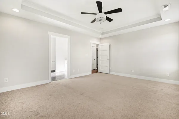 a living room with furniture a rug and a window