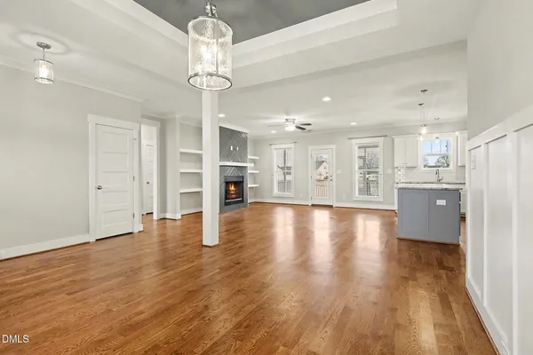 a kitchen with stainless steel appliances granite countertop a sink stove and microwave