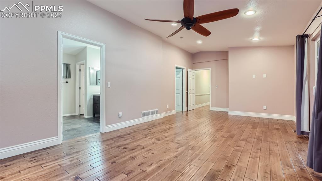 16635 High Tree Drive Elbert, CO 80106 - Photo 14 of 44 a view of an empty room and wooden floor