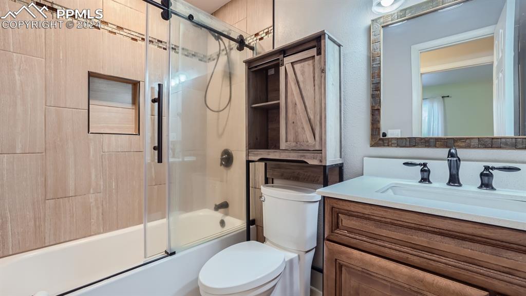 16635 High Tree Drive Elbert, CO 80106 - Photo 24 of 44 a bathroom with a sink a toilet and shower