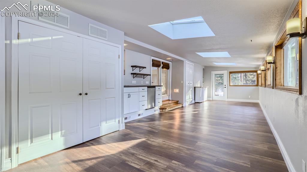16635 High Tree Drive Elbert, CO 80106 - Photo 25 of 44 a view of empty room with wooden floor