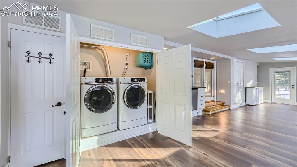 16635 High Tree Drive Elbert, CO 80106 - Photo 26 of 44 a view of a hallway with washer and dryer