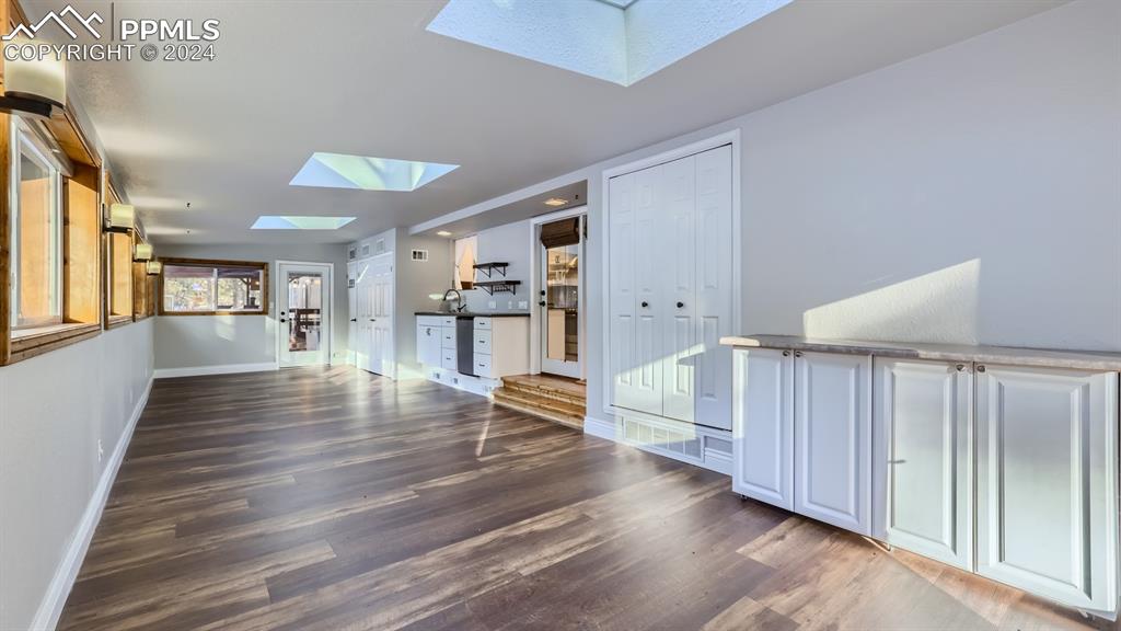 16635 High Tree Drive Elbert, CO 80106 - Photo 29 of 44 a view of an empty room with wooden floor and a window