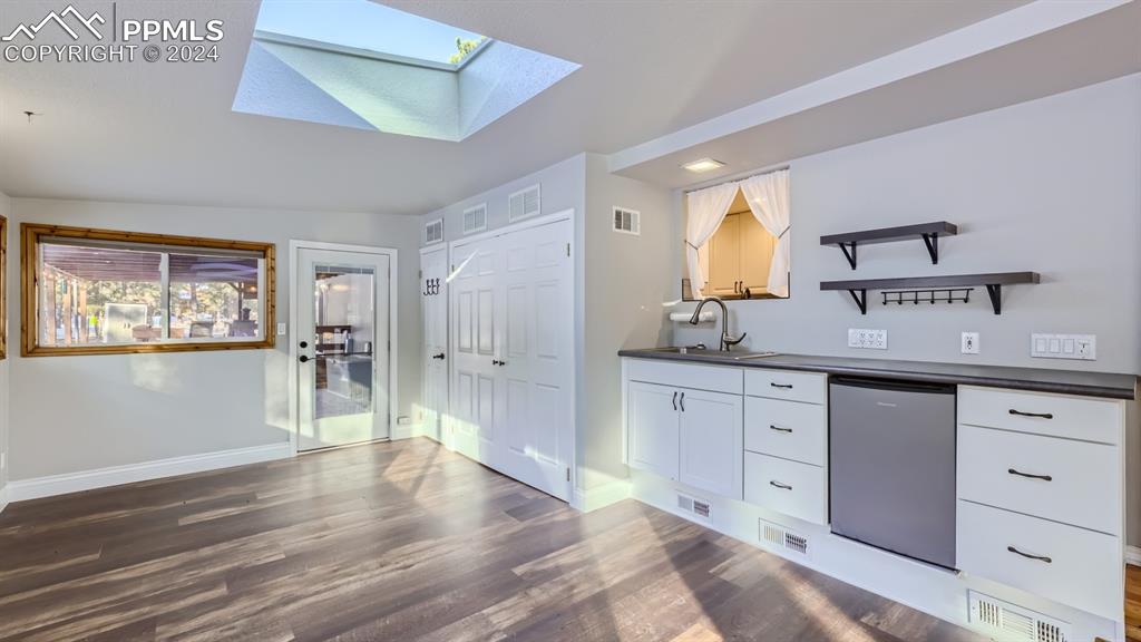16635 High Tree Drive Elbert, CO 80106 - Photo 30 of 44 a spacious bathroom with a granite countertop sink and a mirror