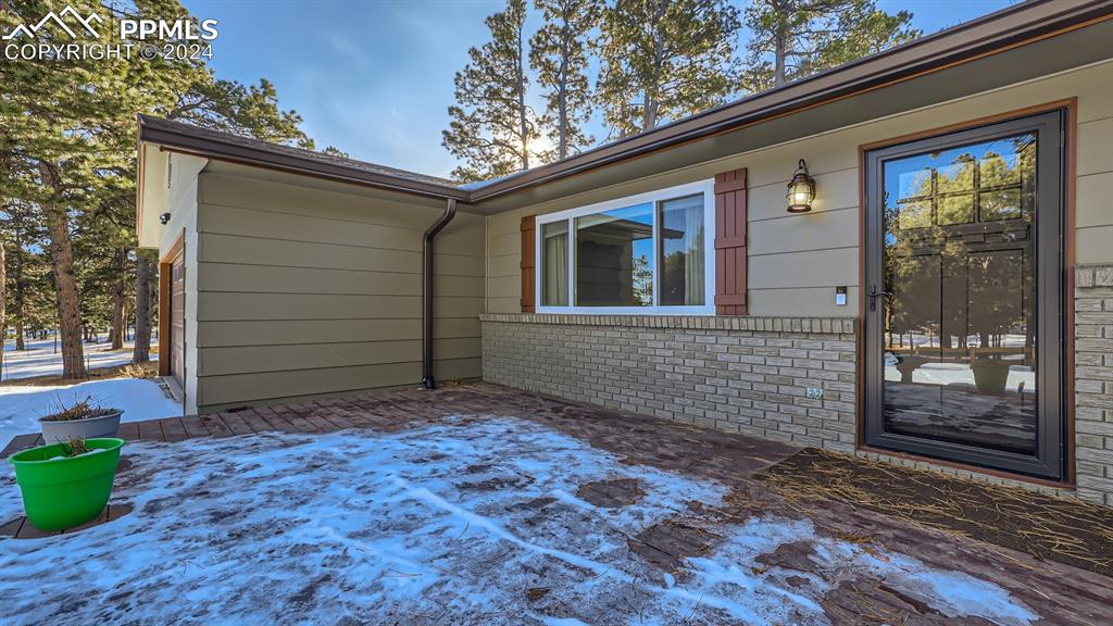 16635 High Tree Drive Elbert, CO 80106 - Photo 3 of 44 a front view of a house with a yard
