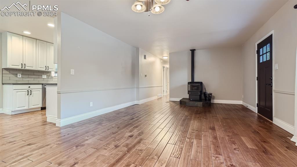 16635 High Tree Drive Elbert, CO 80106 - Photo 5 of 44 a view of empty room with wooden floor