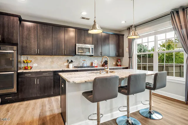 a bathroom with a toilet and a bathtub