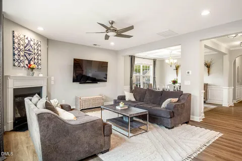 a view of walk in closet with clothes