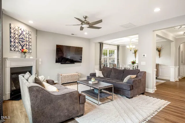 a view of walk in closet with clothes