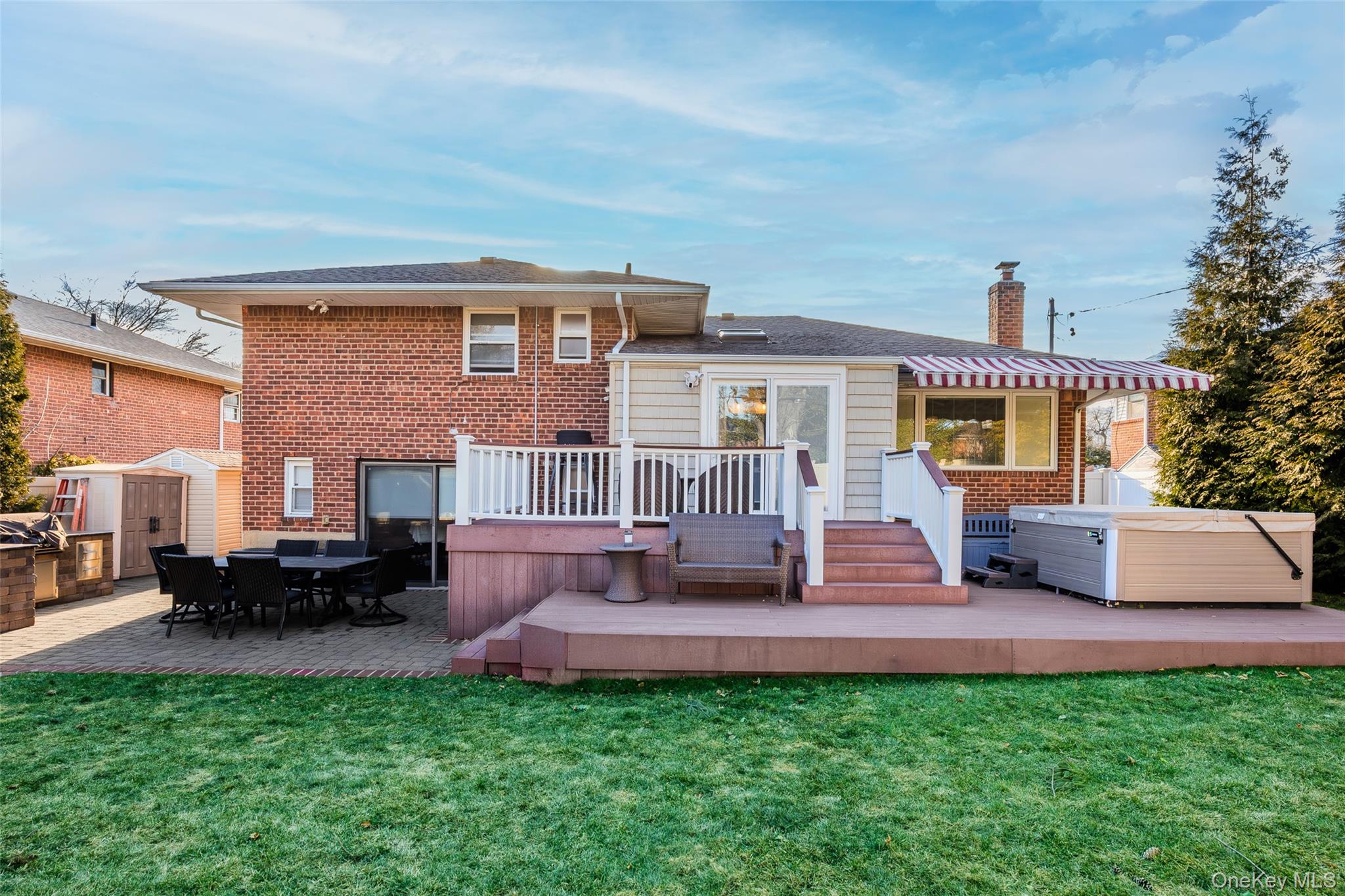 26 Glenwood Road Plainview, NY 11803 - Photo 28 of 42 a front view of a house with patio