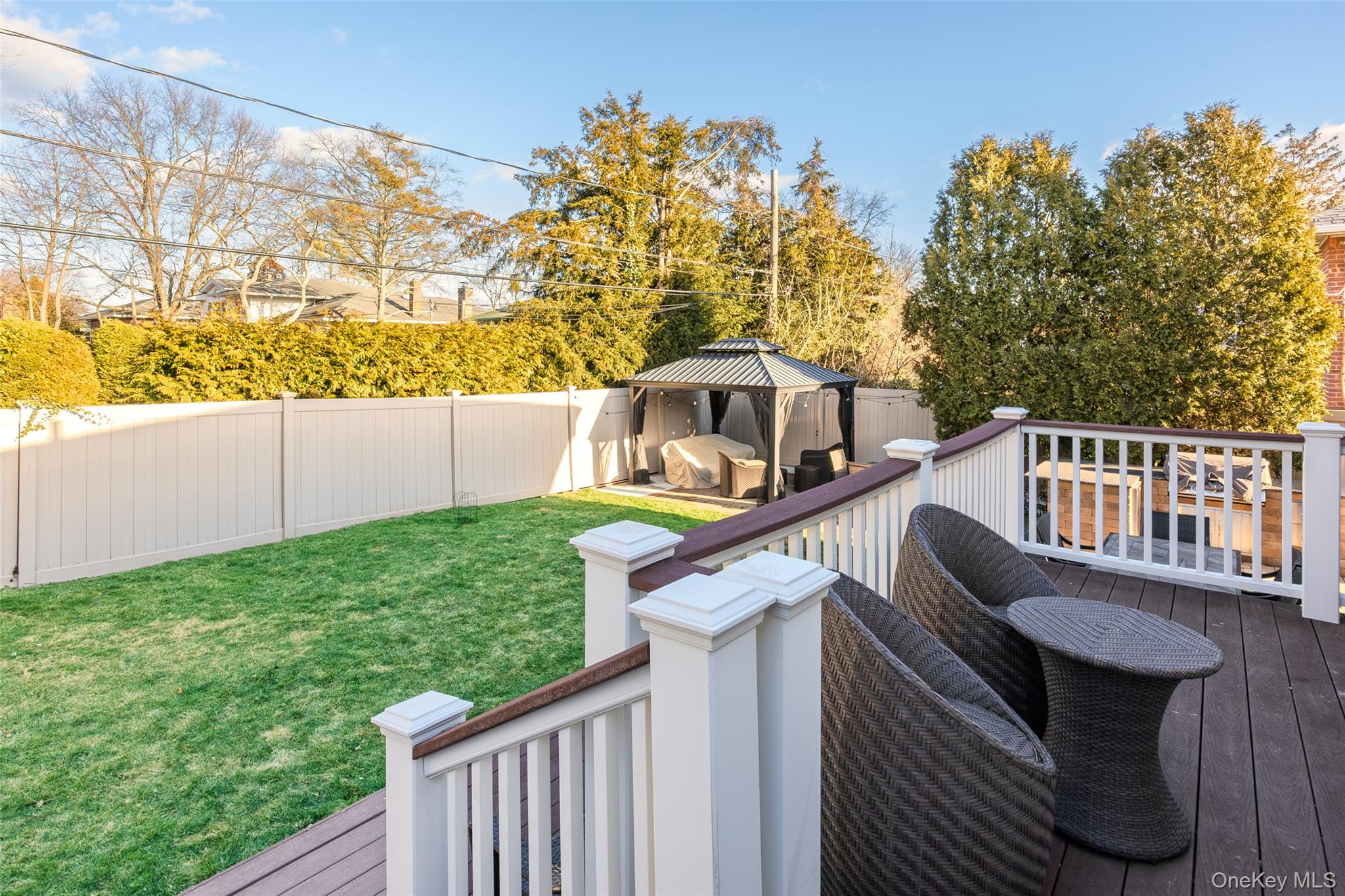 26 Glenwood Road Plainview, NY 11803 - Photo 30 of 42 a view of a deck with a yard