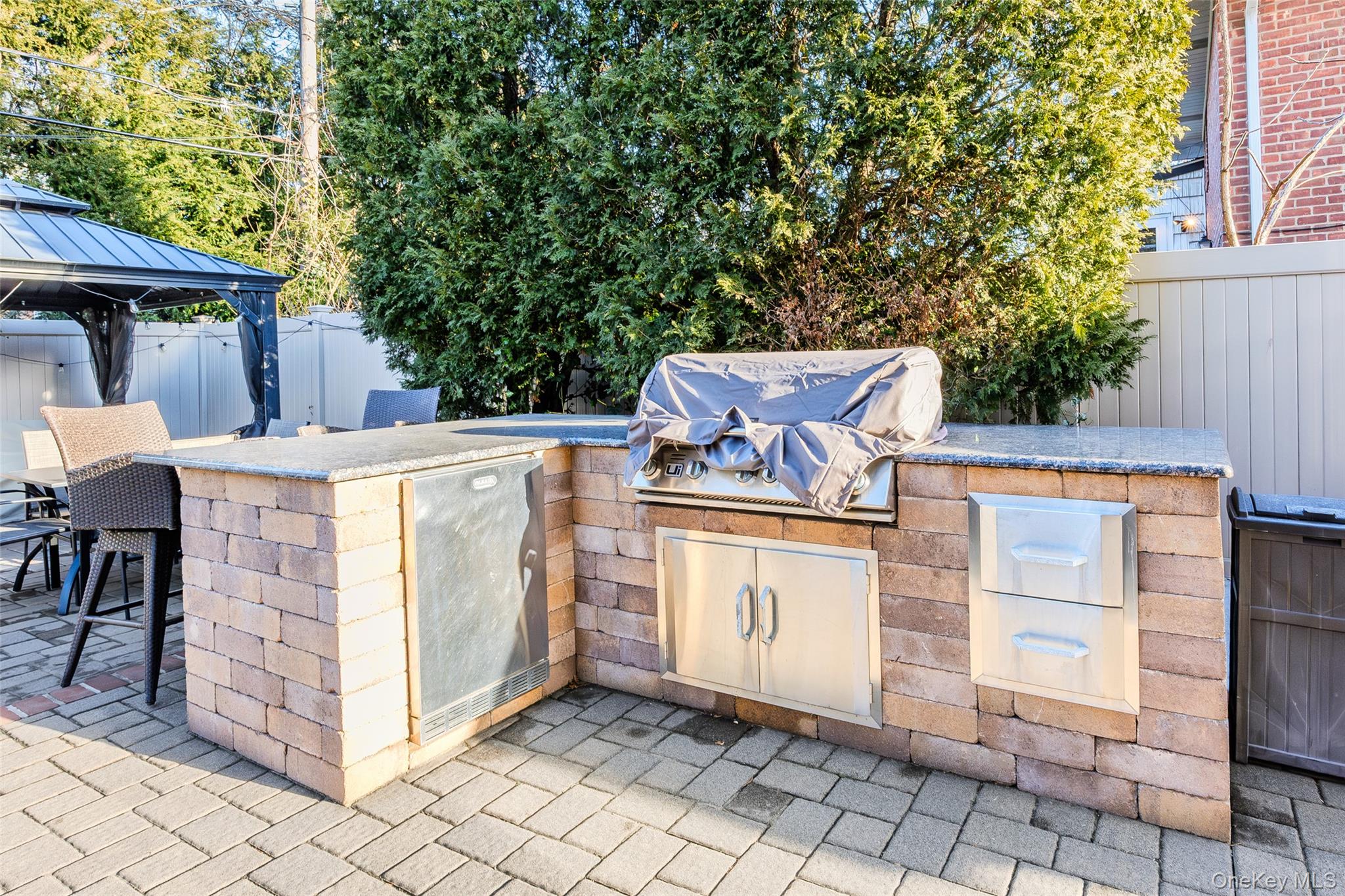 26 Glenwood Road Plainview, NY 11803 - Photo 34 of 42 a view of a barbeque grill with a white stove