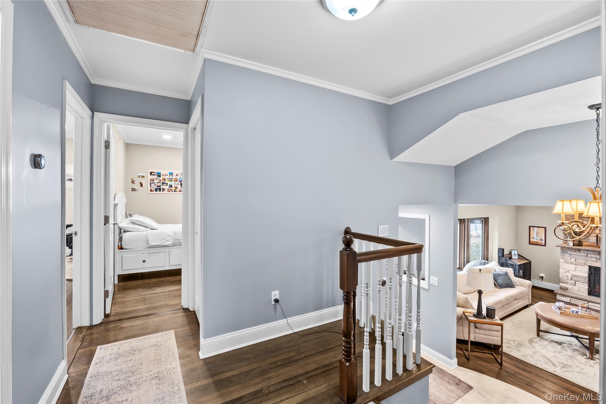 26 Glenwood Road Plainview, NY 11803 - Photo 6 of 42 a bedroom with furniture and wooden floor