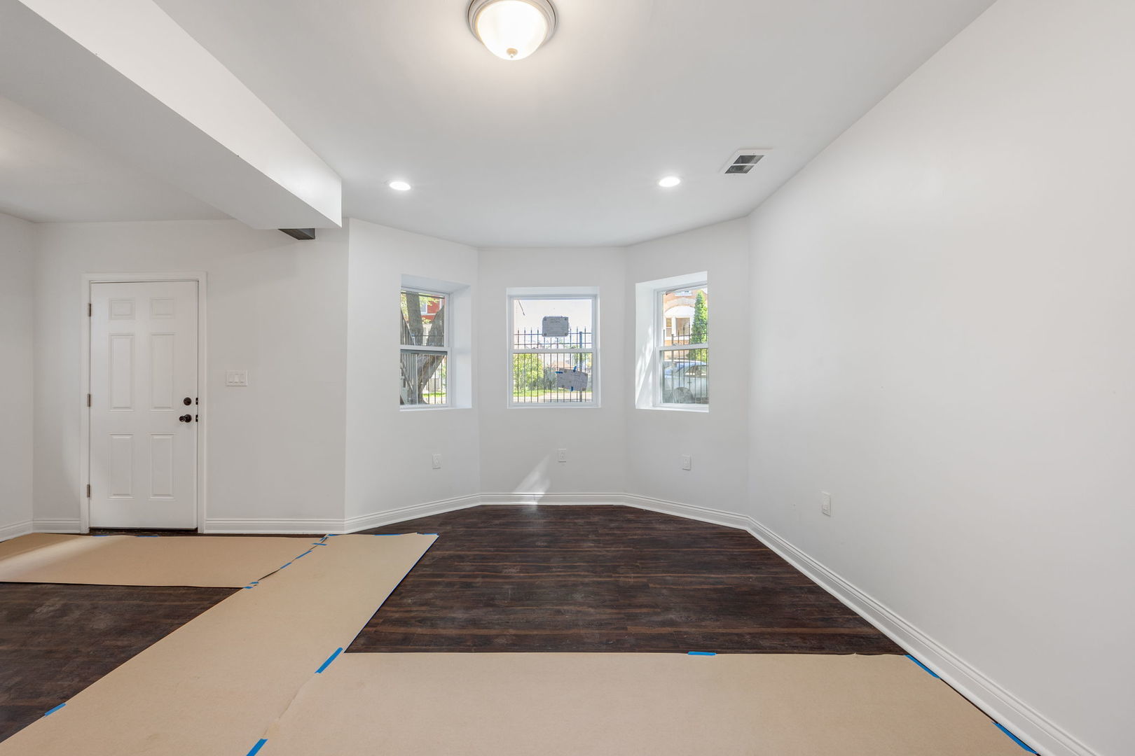 2408 South Trumbull Avenue Chicago, IL 60623 - Photo 21 of 34 a room with a bed and a window