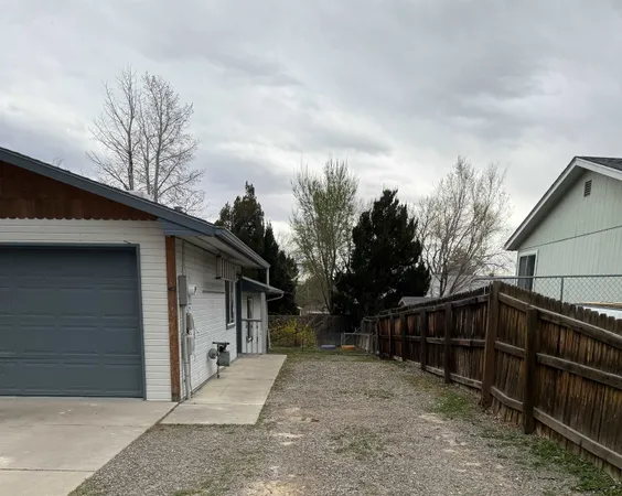 a view of backyard of house