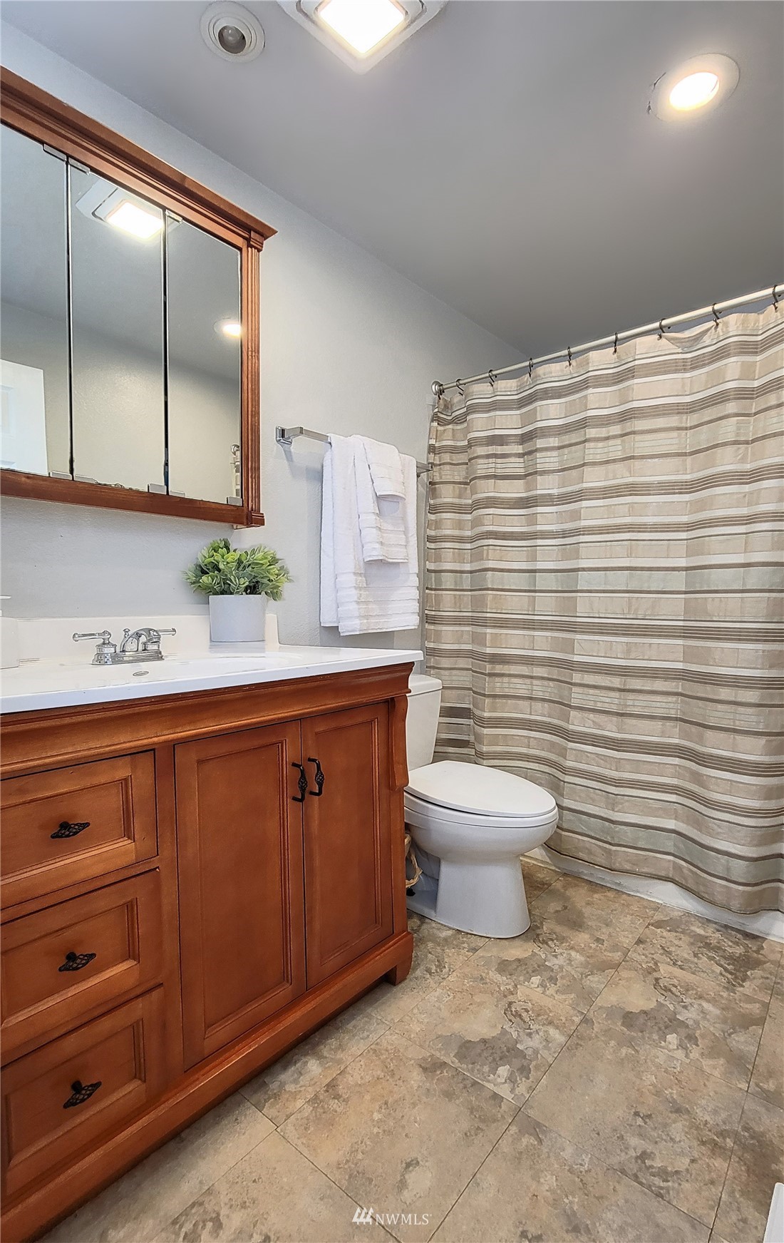 2652 Southwest 333rd Place Federal Way, WA 98023 - Photo 11 of 40 a bathroom with a sink a toilet and mirror