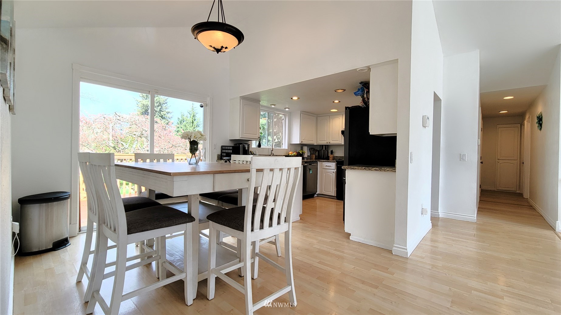 2652 Southwest 333rd Place Federal Way, WA 98023 - Photo 23 of 40 a view of a dining room with furniture window and wooden floor