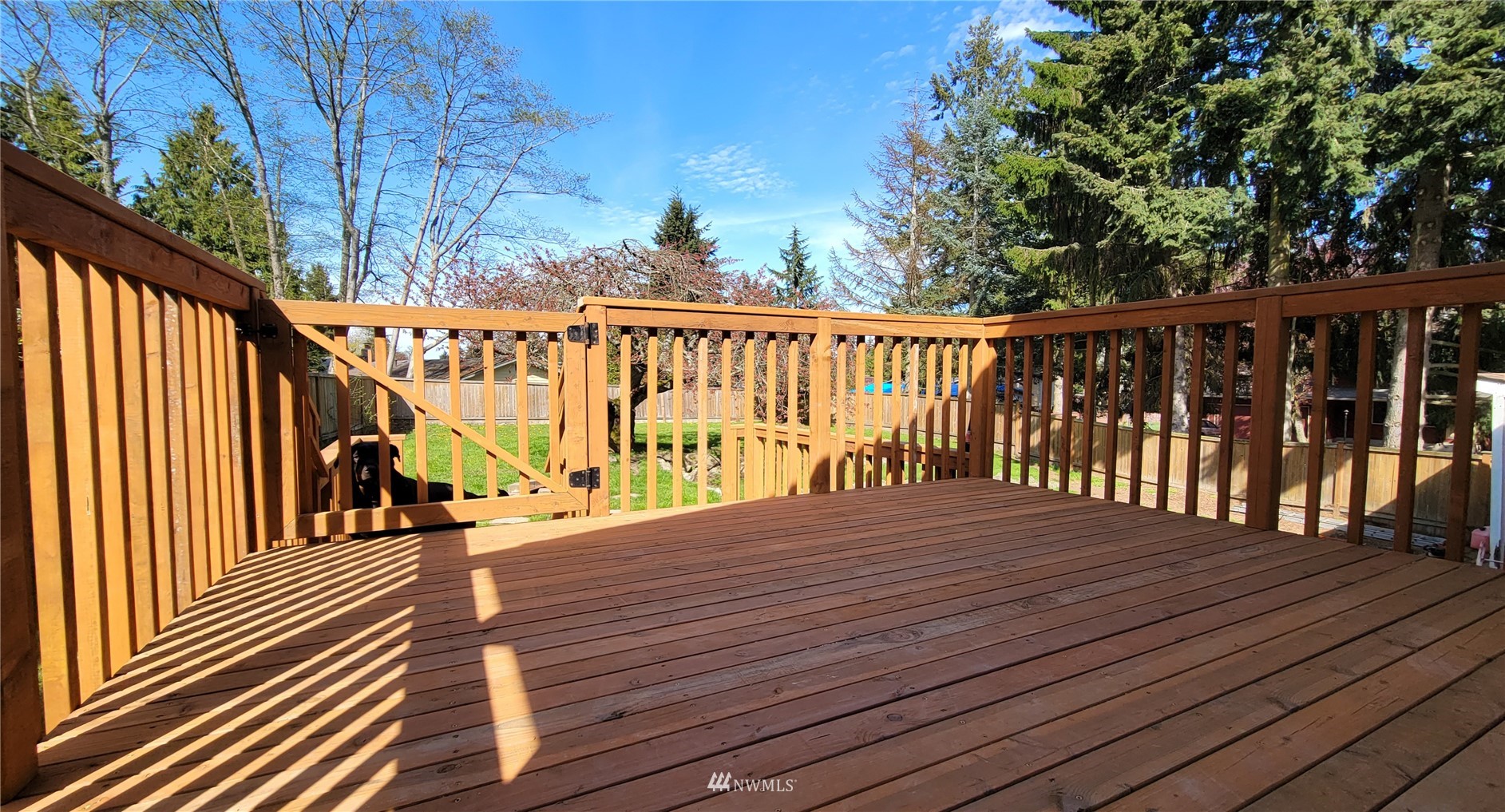 2652 Southwest 333rd Place Federal Way, WA 98023 - Photo 4 of 40 a view of a balcony with wooden floor and fence