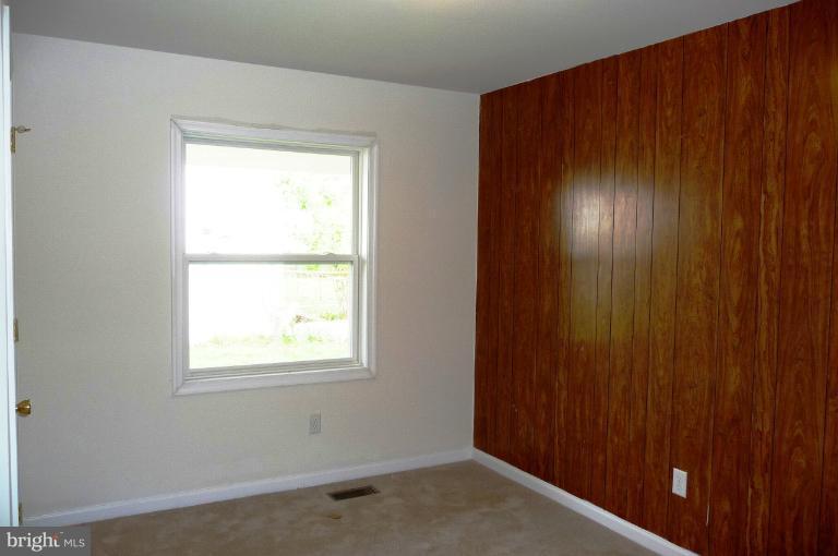 117 Spring Street Gaithersburg, MD 20877 - Photo 11 of 23 a view of an empty room and window