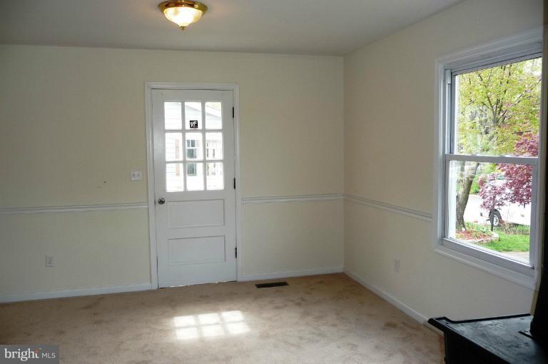 117 Spring Street Gaithersburg, MD 20877 - Photo 14 of 23 an empty room with windows