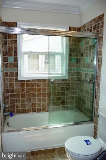 117 Spring Street Gaithersburg, MD 20877 - Photo 18 of 23 a bathroom with toilet shower and bathtub