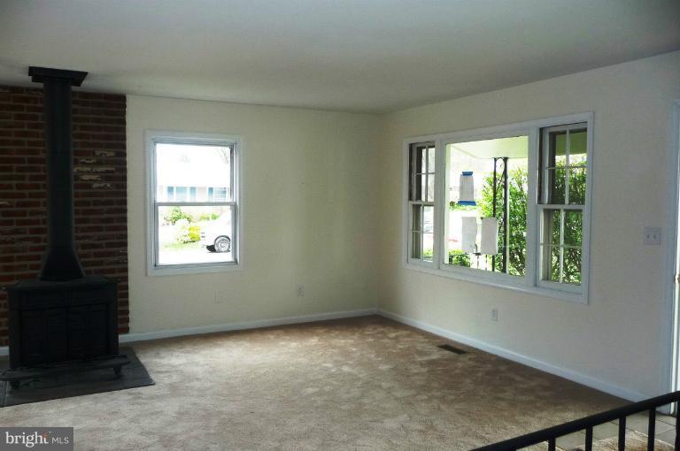 117 Spring Street Gaithersburg, MD 20877 - Photo 8 of 23 a view of an empty room with a window