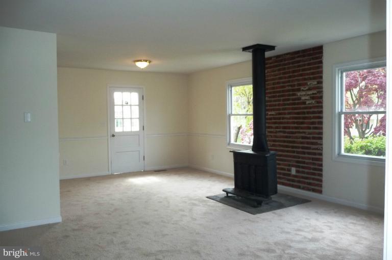 117 Spring Street Gaithersburg, MD 20877 - Photo 10 of 23 a view of an empty room with a window