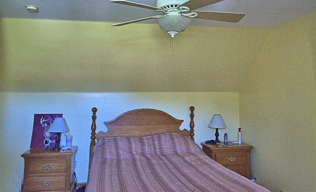 a view of a lake with a yard