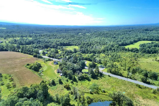 a view of backyard with green space