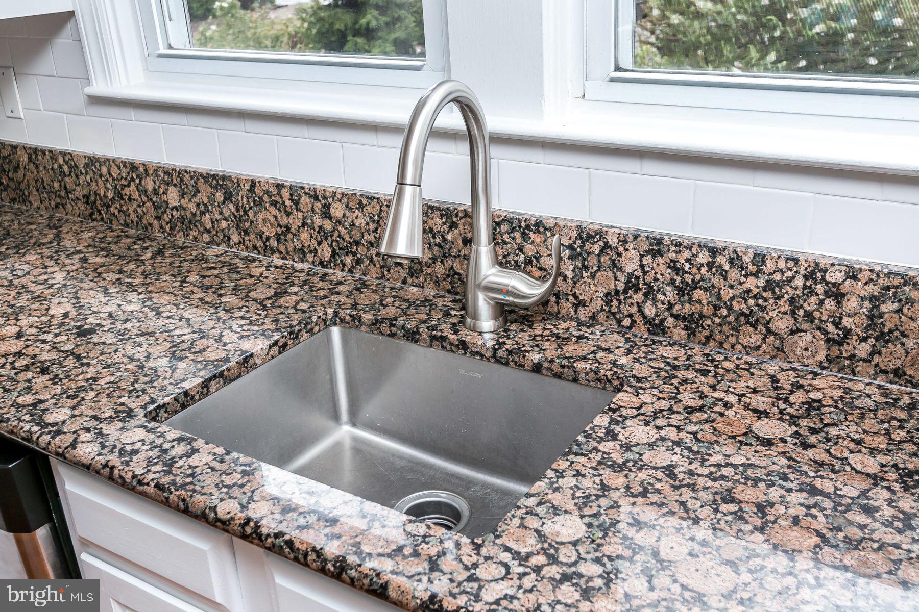 816 Warwick Road Baltimore, MD 21229 - Photo 15 of 44 Updated kitchen w/granite & SS appliances