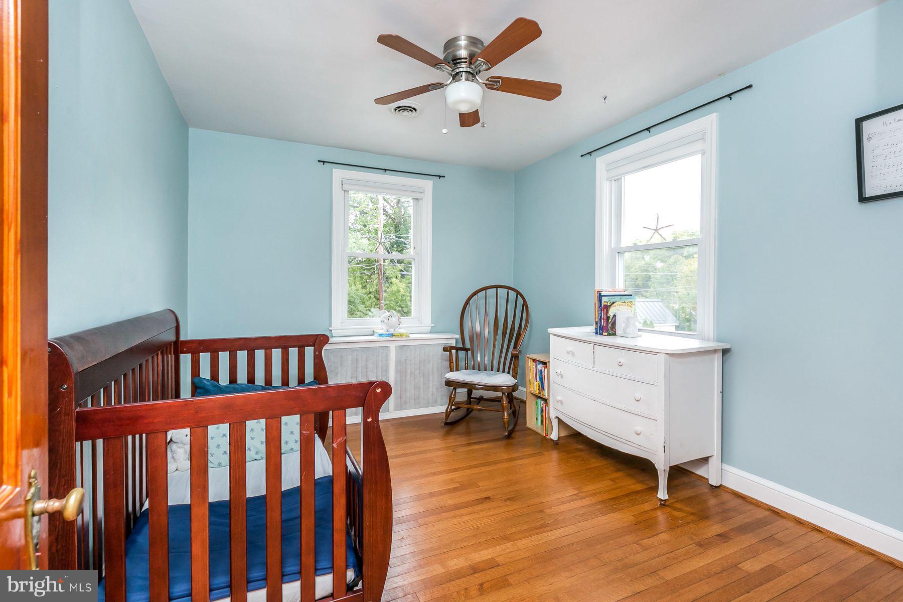 816 Warwick Road Baltimore, MD 21229 - Photo 24 of 44 Bedroom w/hardwood floors & ceiling fan