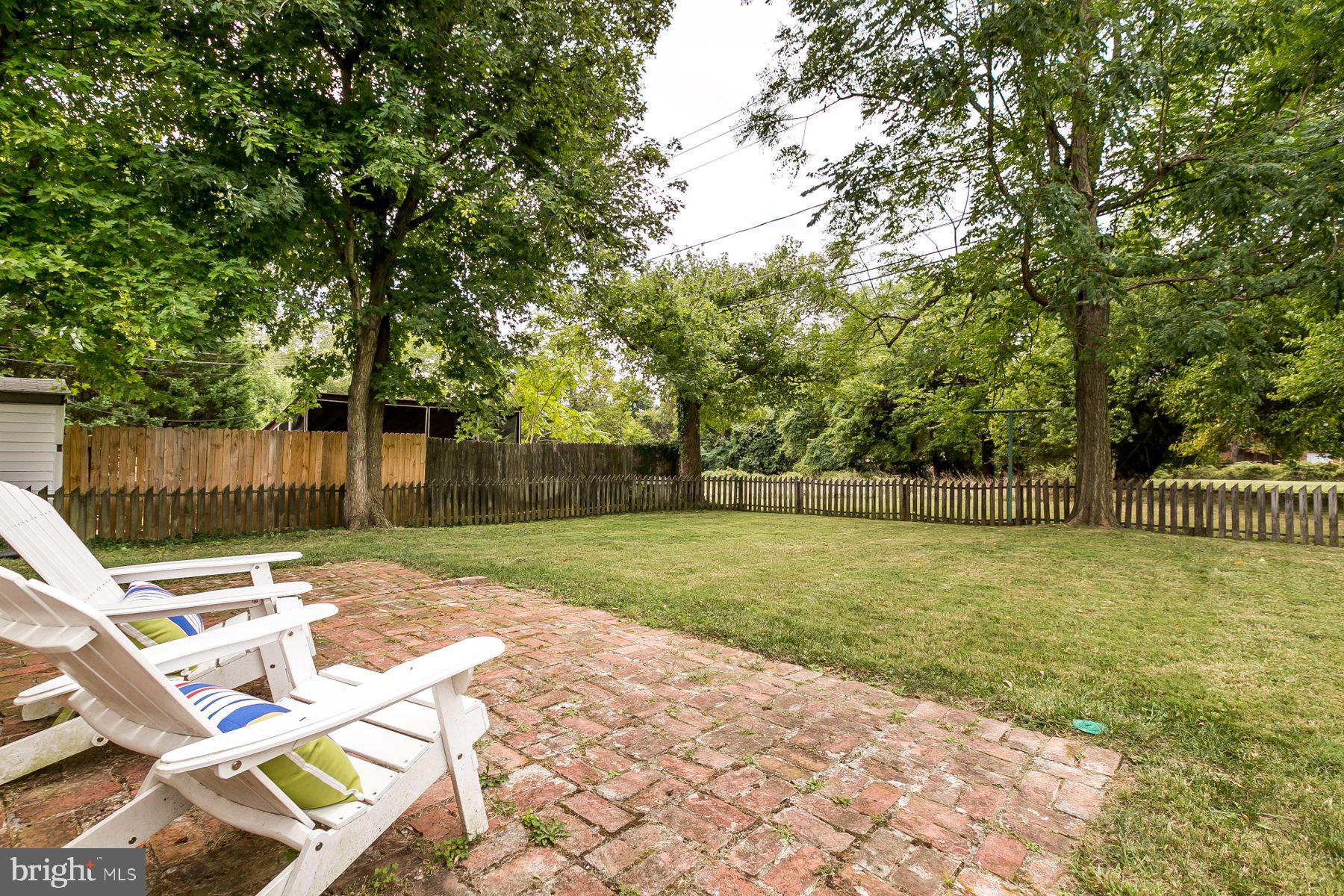 816 Warwick Road Baltimore, MD 21229 - Photo 37 of 44 Flat backyard with patio backing to green space