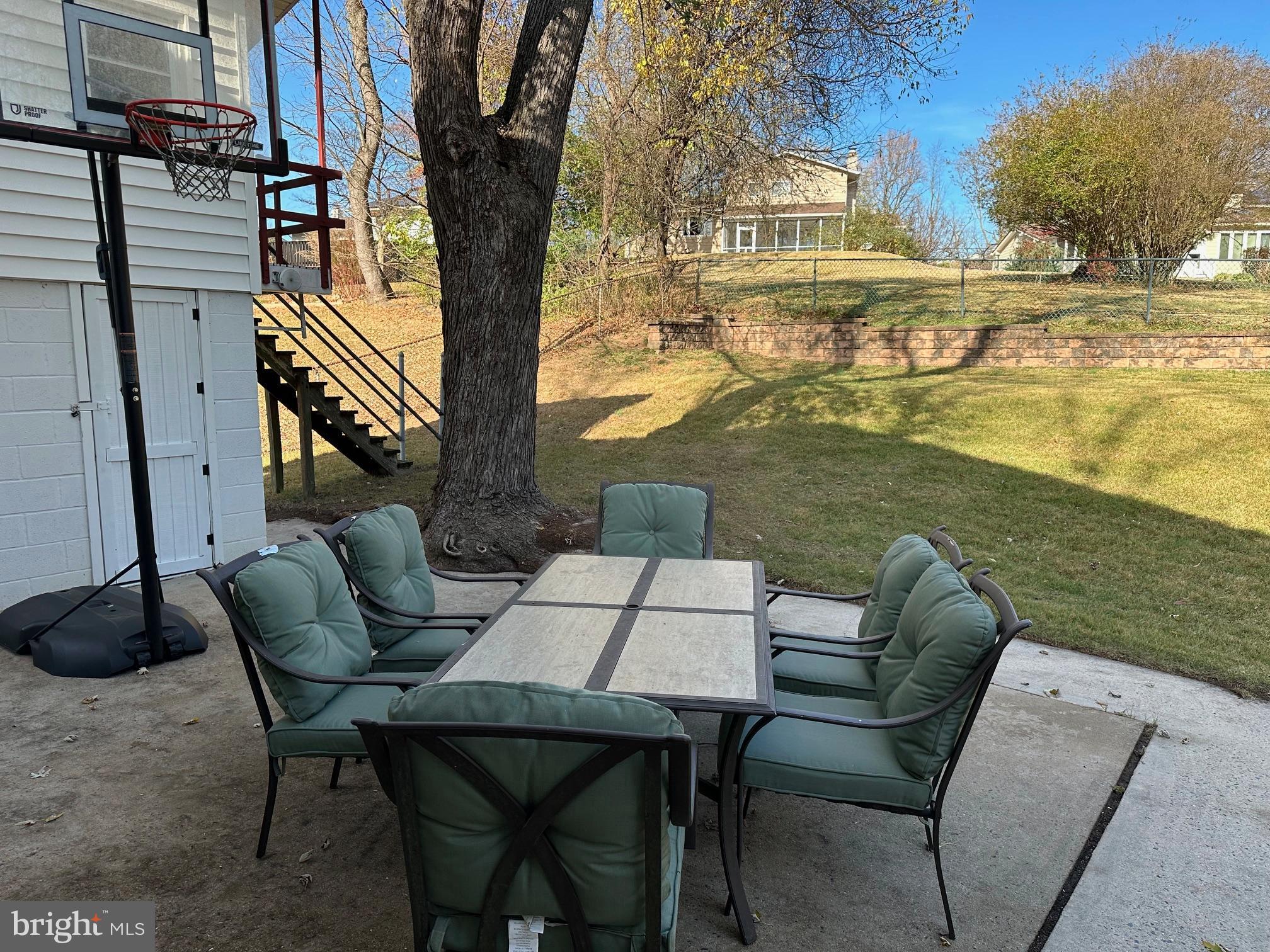5405 Manorfield Road Rockville, MD 20853 - Photo 26 of 34 Patio table at rear of home