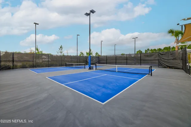 a view of swimming pool with outdoor seating and yard