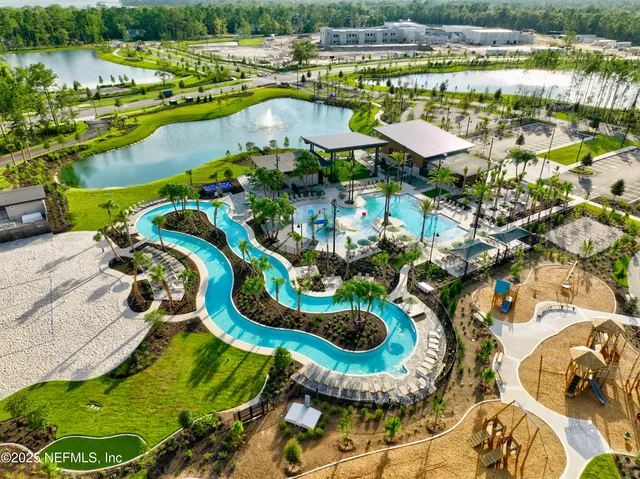 a view of yard with swimming pool and outdoor seating