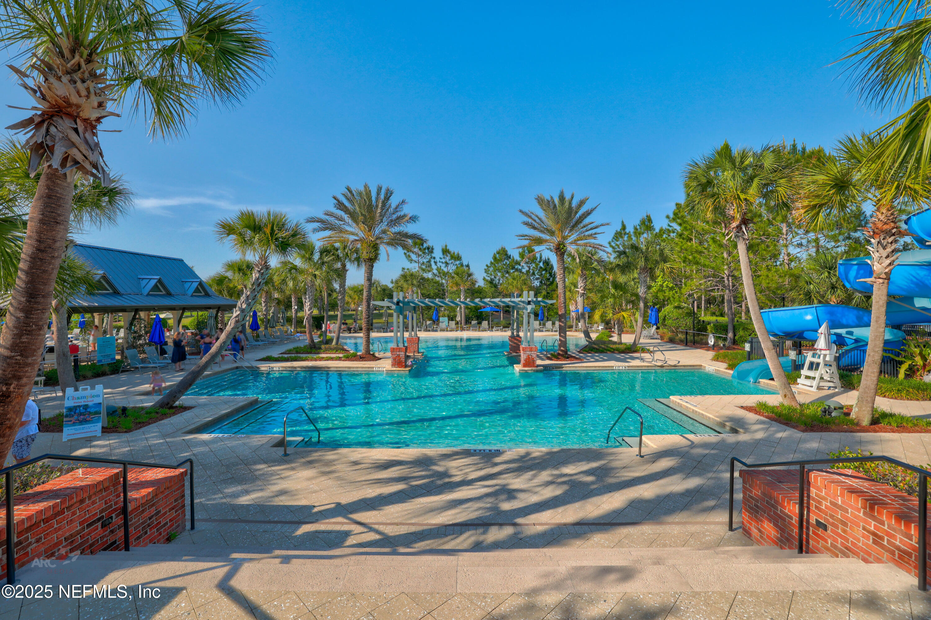 44 Pinellas Way St. Johns, FL 32259 - Photo 42 of 51 a view of yard with swimming pool and outdoor seating