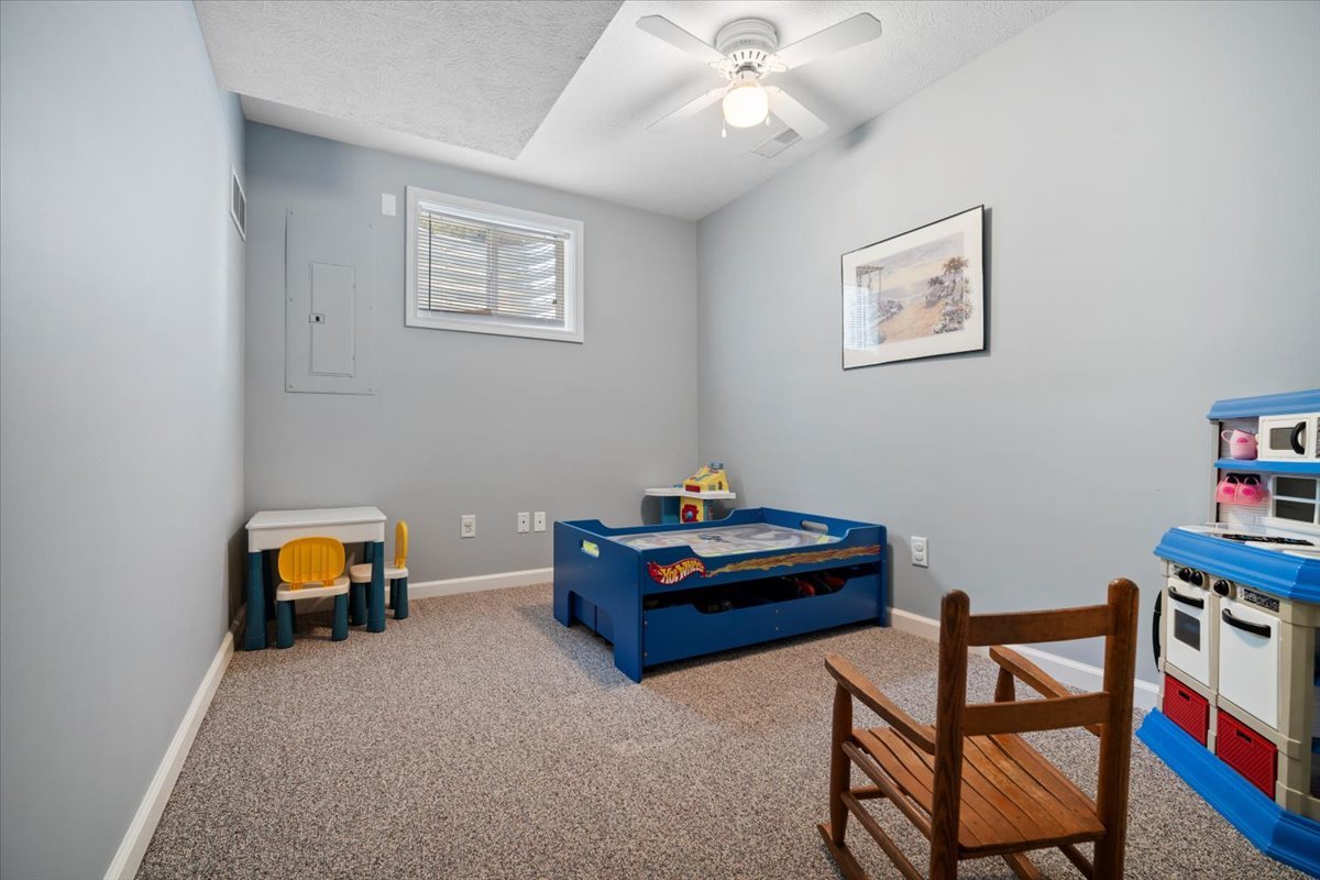 3205 Stonebridge Drive Bloomington, IL 61704 - Photo 26 of 37 a room with furniture and air hockey table