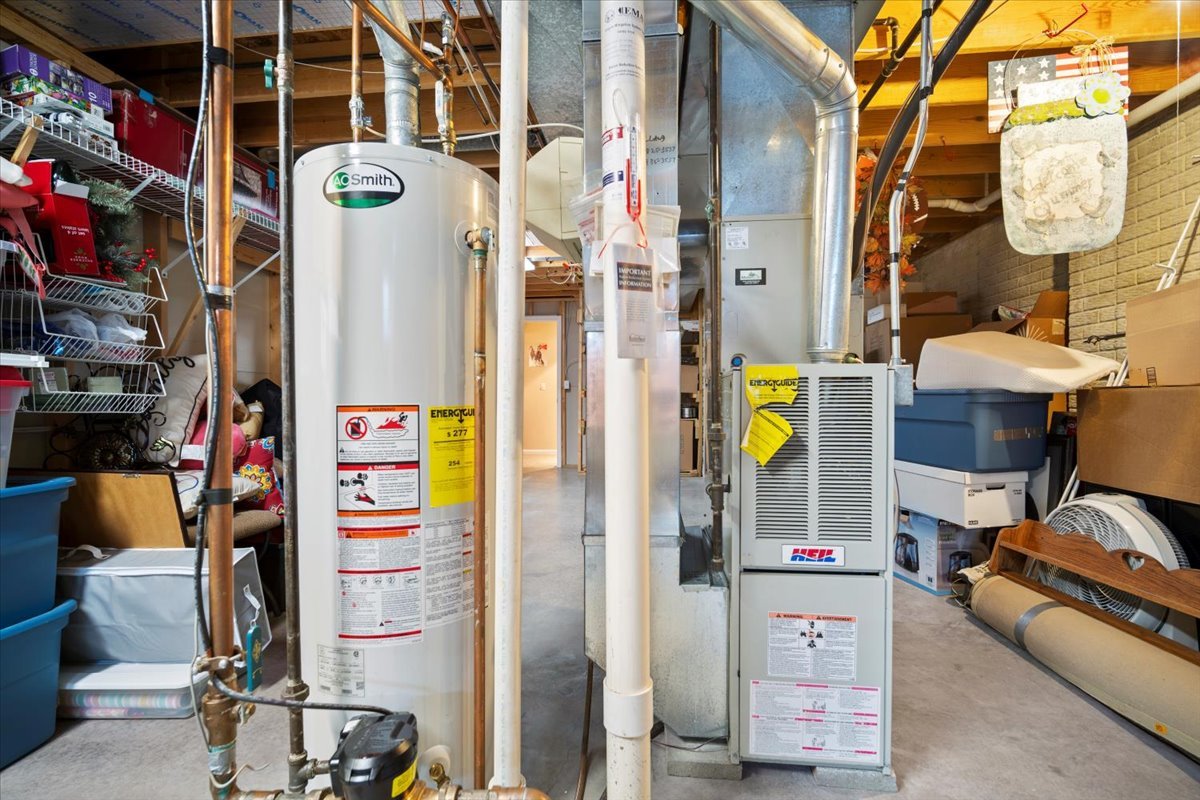 3205 Stonebridge Drive Bloomington, IL 61704 - Photo 29 of 37 a bathroom with a sink and a mirror